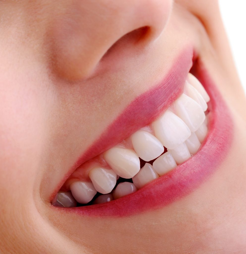 Beautiful Smile With Dental Mirror
